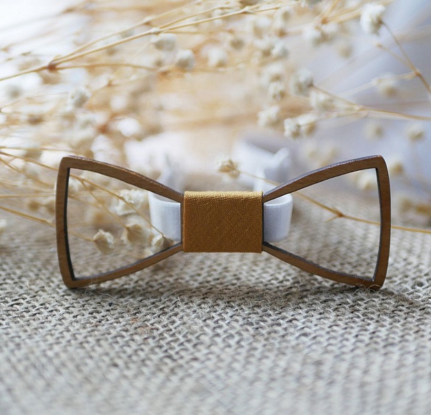 Mini sl&oslash;yfe av tre med uthulte arasbesker 